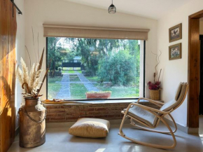 Casa vacacional con gran parque, quincho y pileta